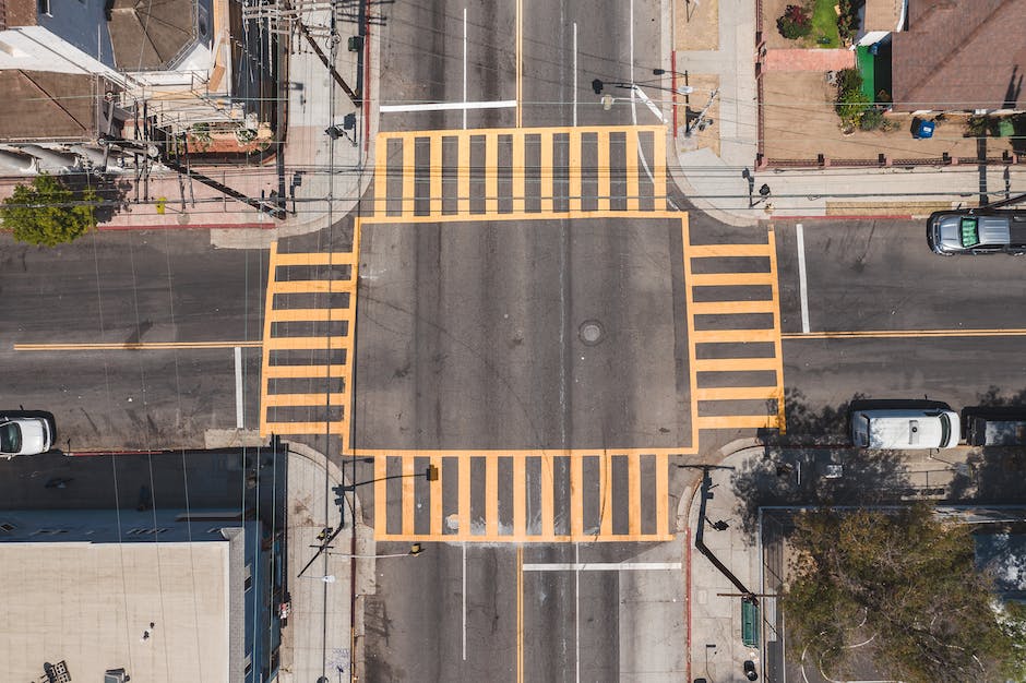 An image of a person standing at a crossroad trying to make a decision, representing the intersection of emotion and investment in the text.